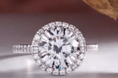 Diamond memorial ring with a halo setting, designed as a lasting tribute and remembrance of a loved one.